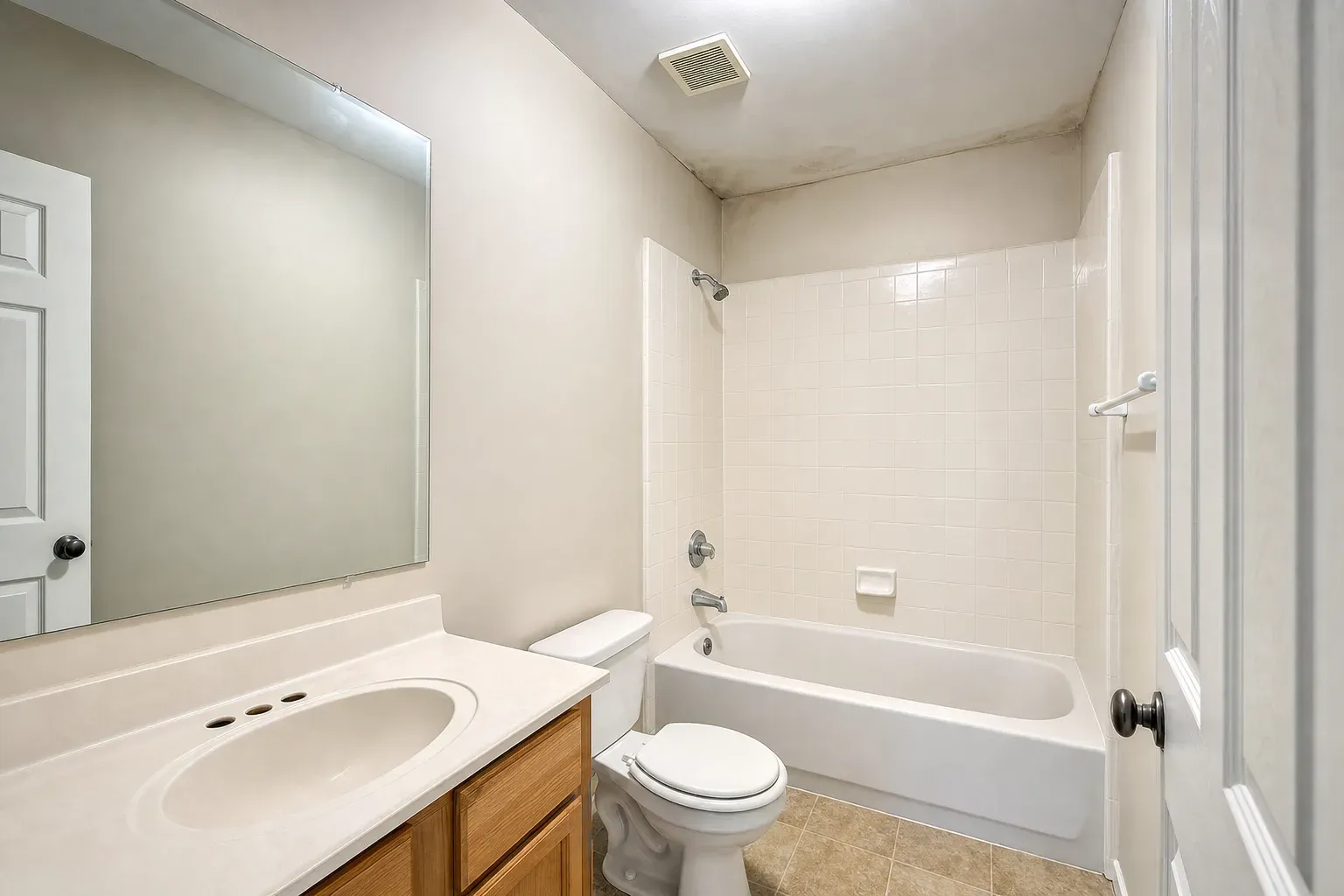 Third-floor hallway bathroom evaluated during a real estate mold inspection in a York County townhouse.